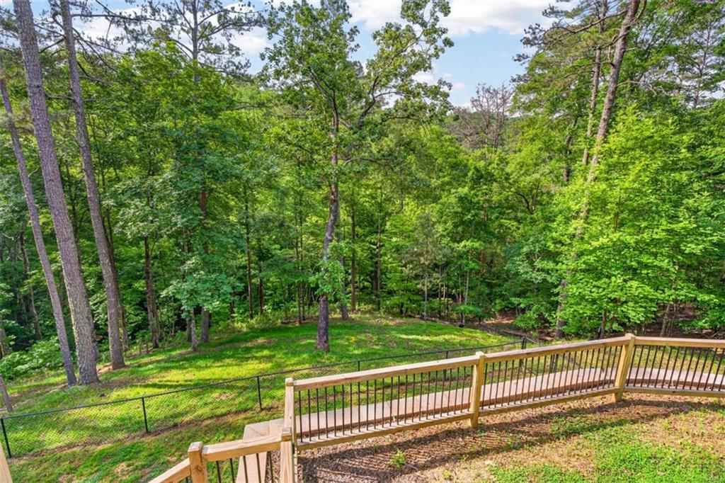 Fully furnished true log home on 5.78 private wooded acres in sought-a – image 54