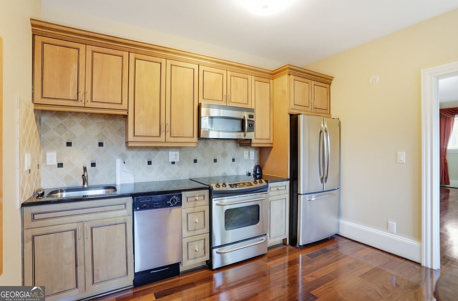 Set on 3.8 beautifully manicured acres, this elegant gated estate offe – image 99