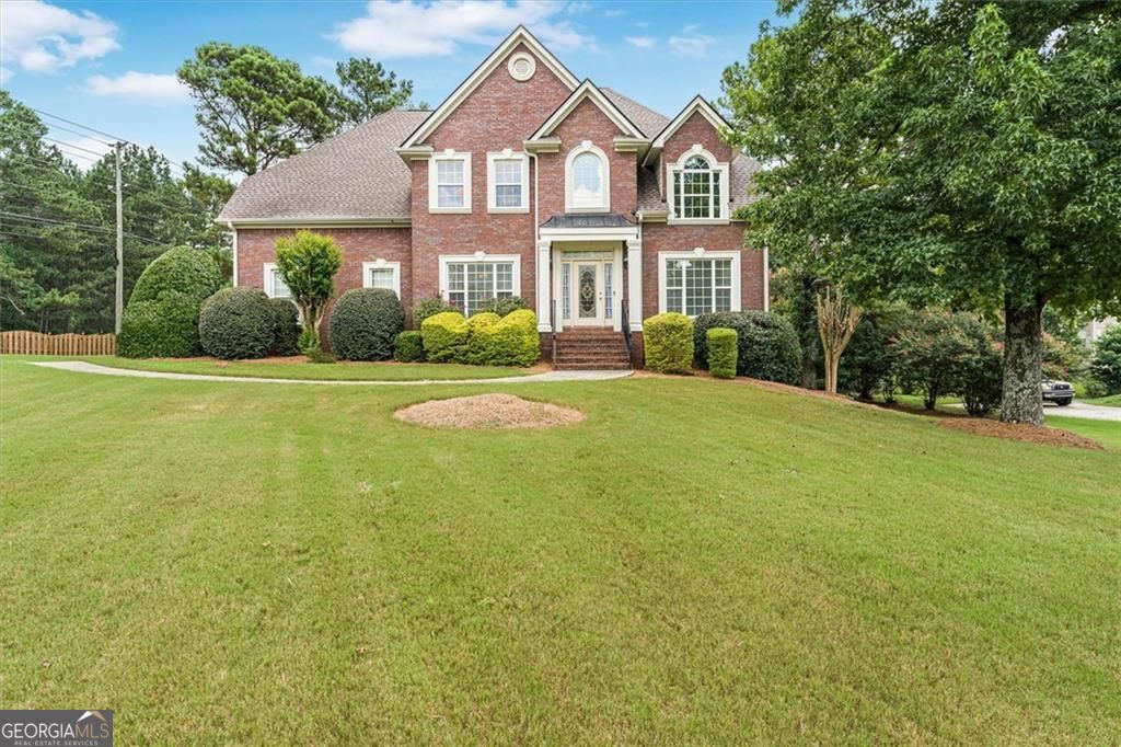 Welcome to 101 Lumby Lane, a stunning 4-sided brick residence in the s – image 1