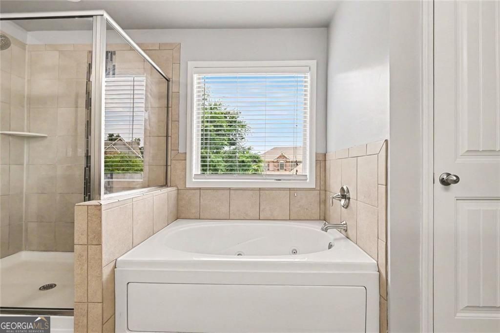 Location, location for this one, so close to the Mall of Georgia with – image 35