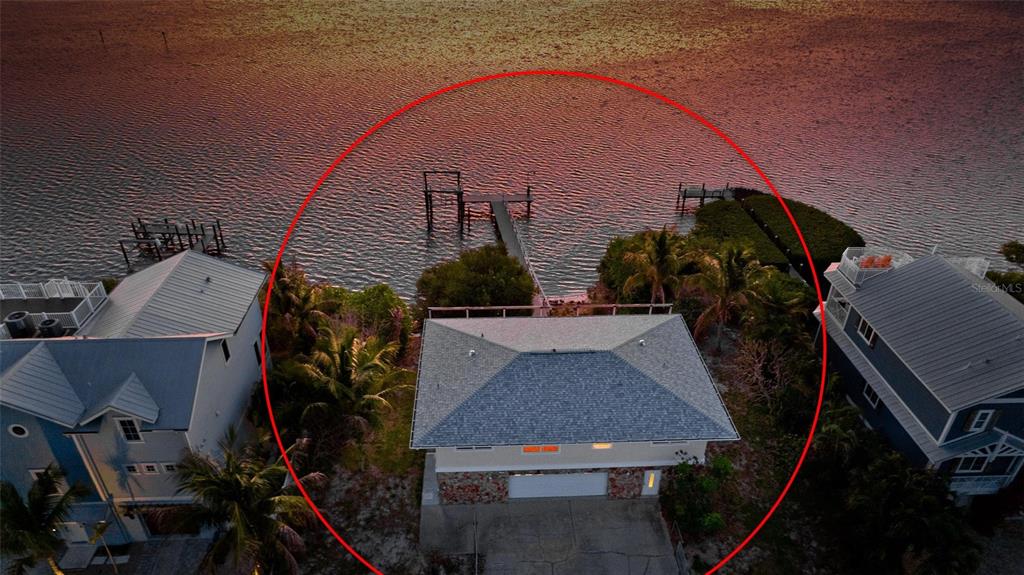 CONFIRMED POTENTIAL FOR TWO BUILDABLE WATERFRONT LOTS - This rare offe – image 17