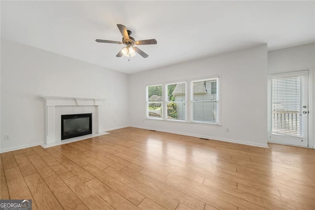 Just listed in the sought-after Arbors at Old Peachtree subdivision! T – image 10