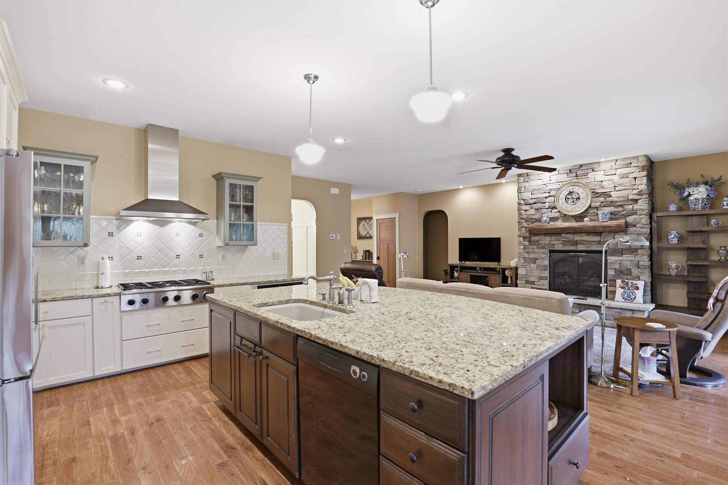Tucked away on over an acre along the Little Muskegon River in the hea – image 17