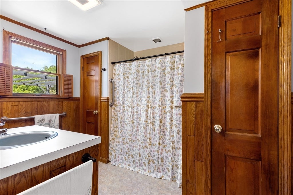 Nestled on over 2 acres, this Classic New England Cape offers the perf – image 10