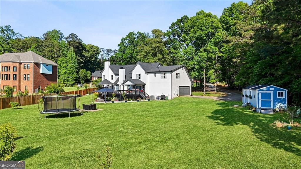 Welcome to 1229 Park Place Drive, a beautifully updated waterfront res – image 9