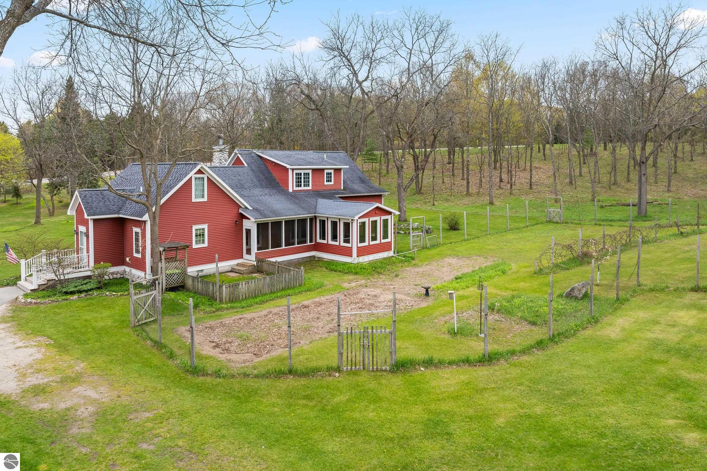 This 3-bedroom, 2.5-bath farmhouse offers a property designed for coun – image 50