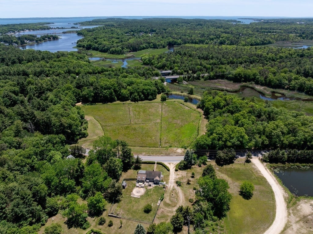 Nestled on over 2 acres, this Classic New England Cape offers the perf – image 36