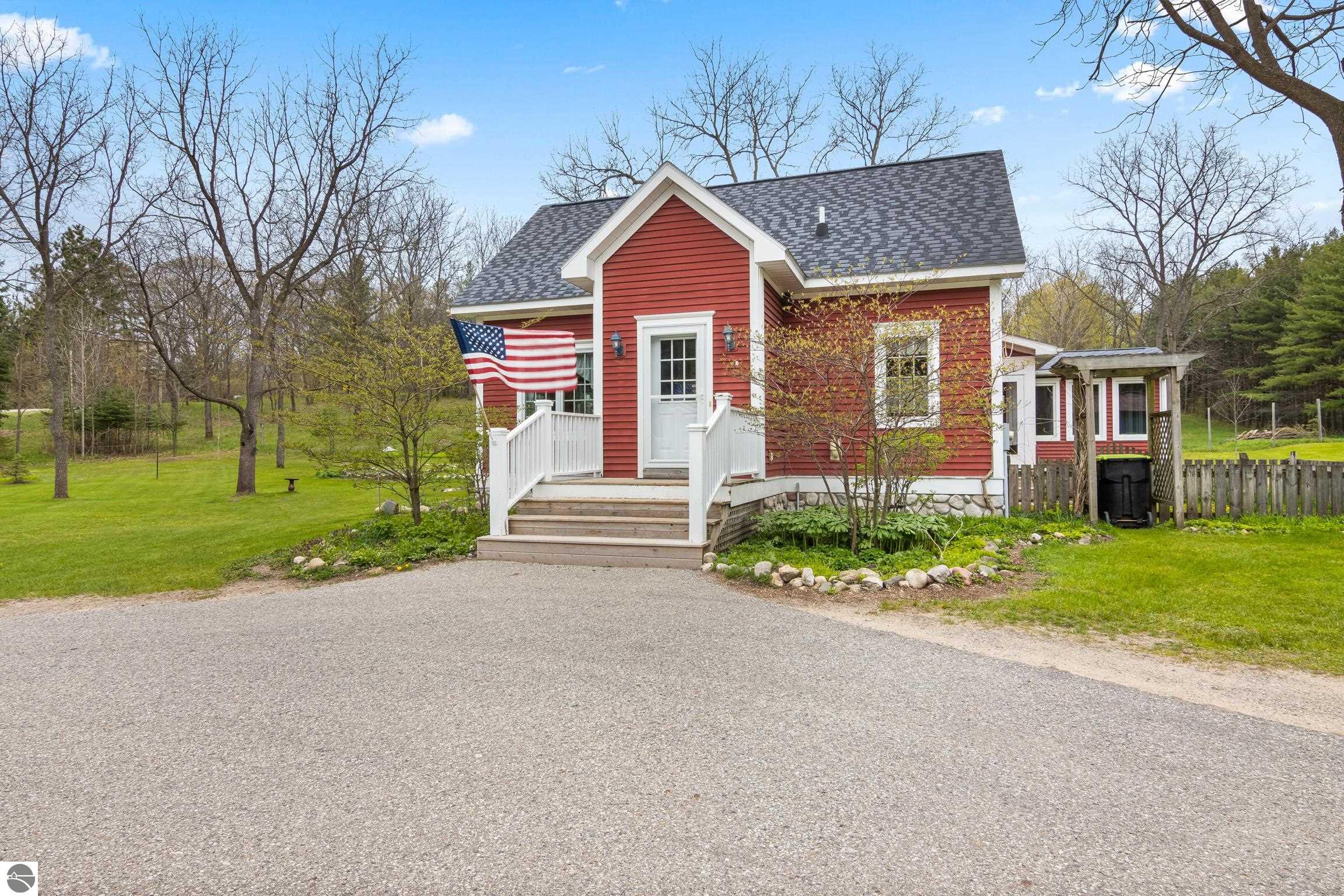 This 3-bedroom, 2.5-bath farmhouse offers a property designed for coun – image 8