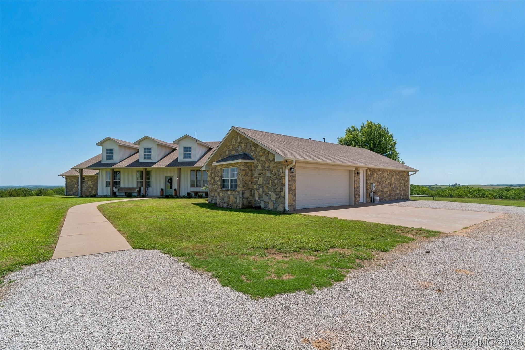 Country Luxury at Its Finest! Nestled on 18 breathtaking acres with pa – image 7