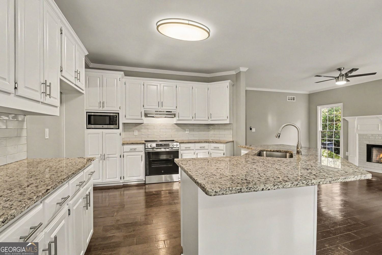 Welcome to a beautifully renovated home featuring a fully finished bas – image 9