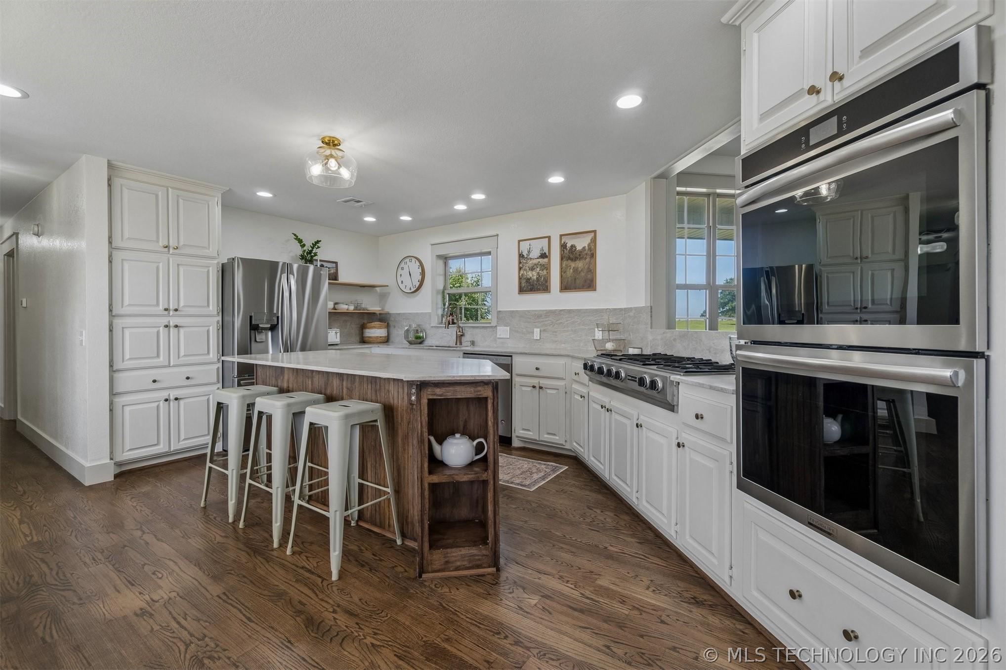 Country Luxury at Its Finest! Nestled on 18 breathtaking acres with pa – image 23