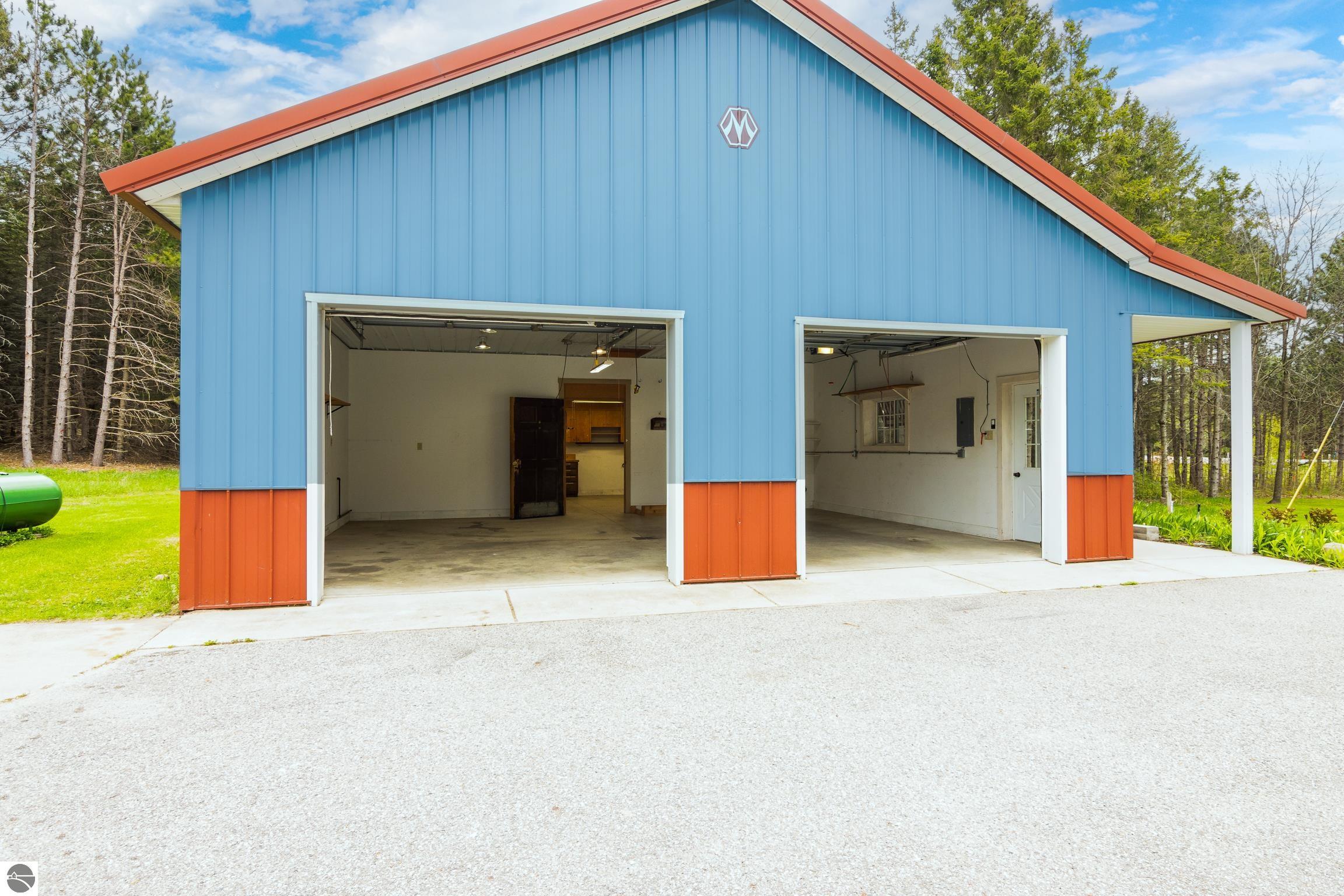 This 3-bedroom, 2.5-bath farmhouse offers a property designed for coun – image 57