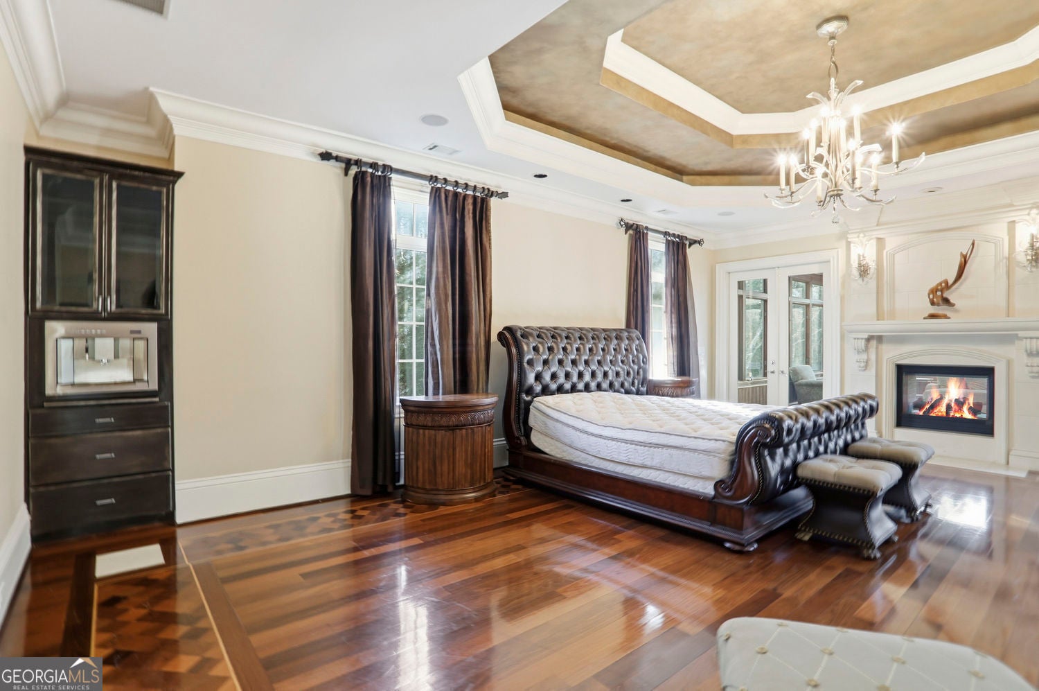 Set on 3.8 beautifully manicured acres, this elegant gated estate offe – image 104