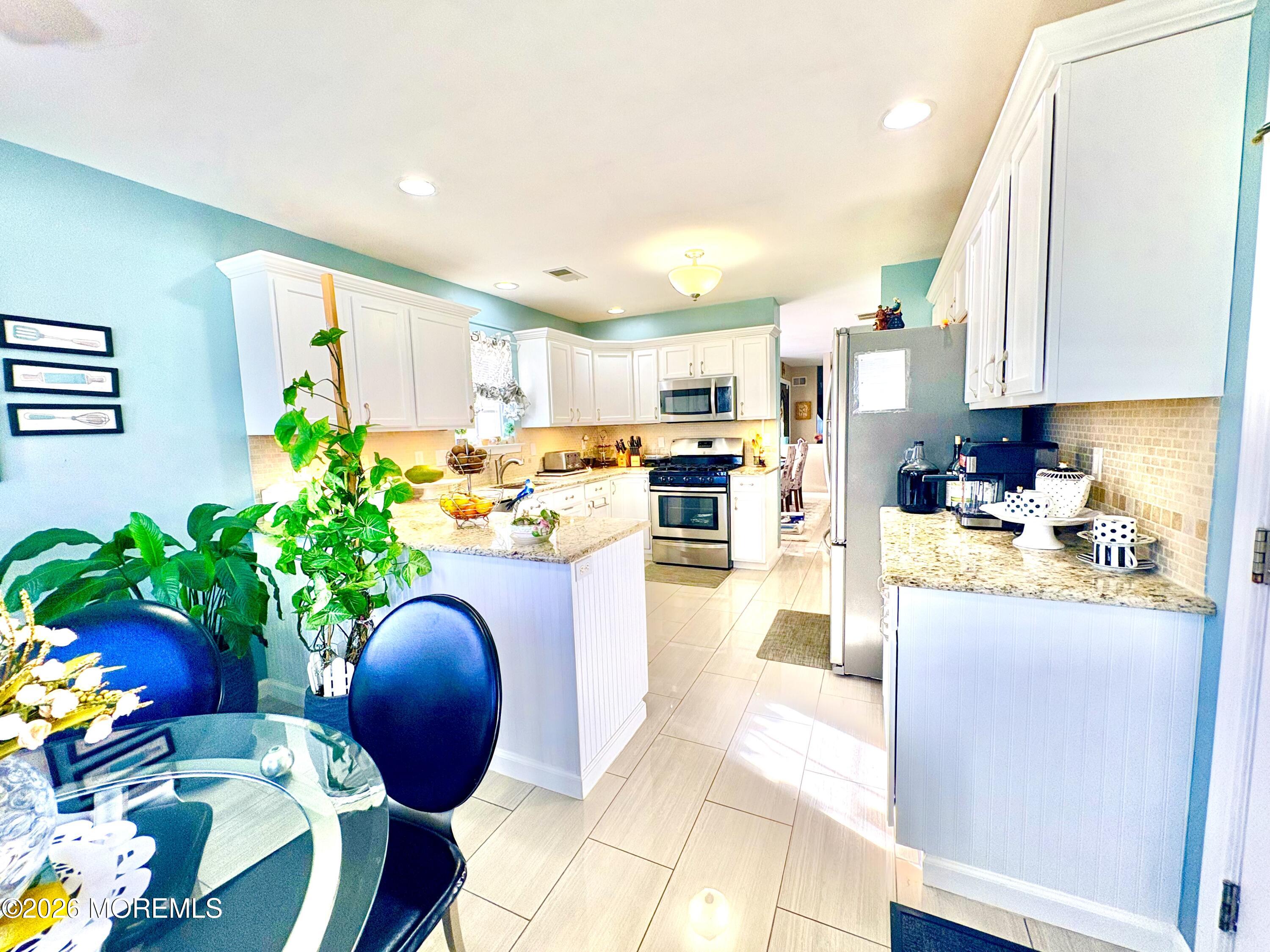 No expense spared in this impeccably upgraded home in the sought-after – image 6