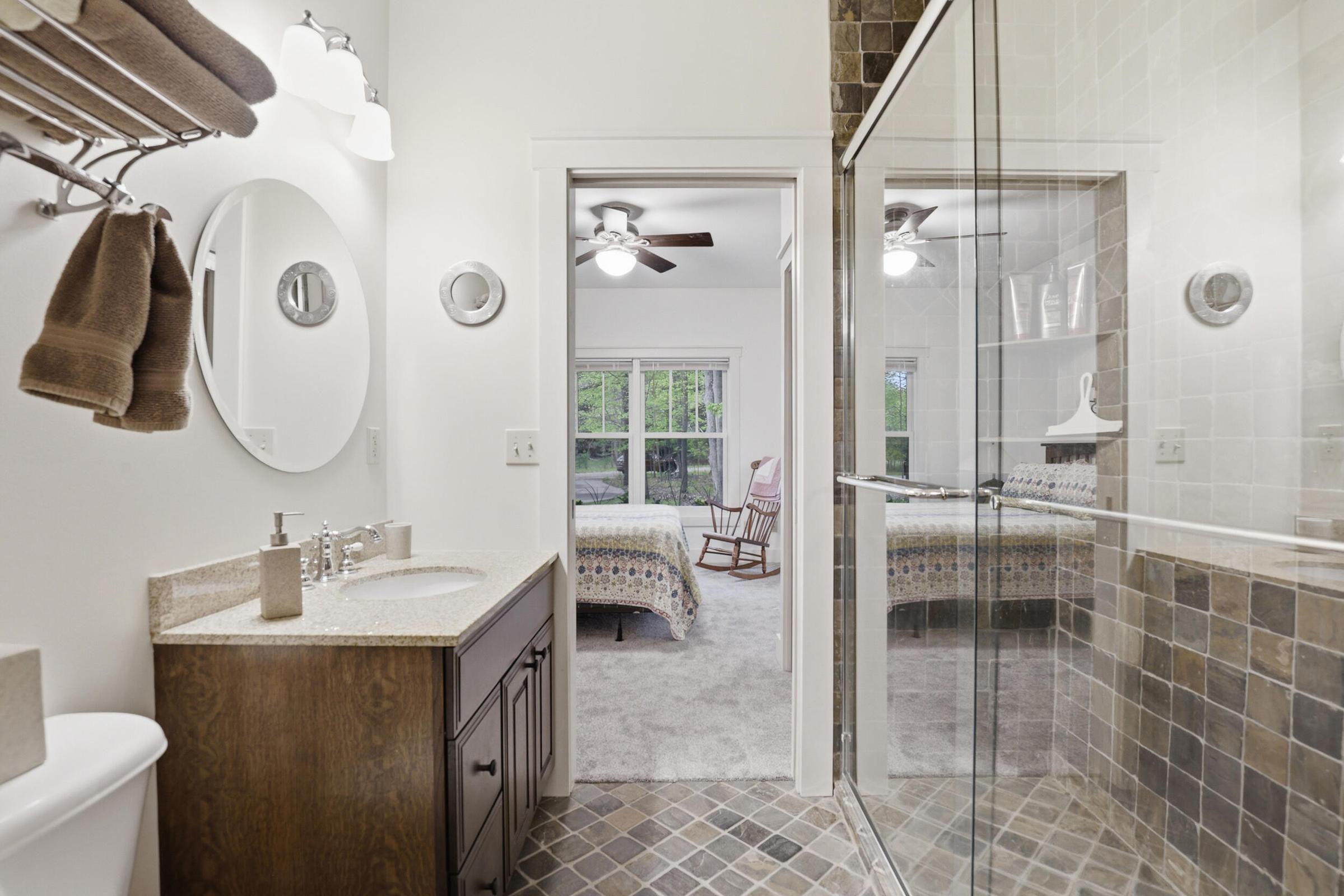 Tucked away on over an acre along the Little Muskegon River in the hea – image 31