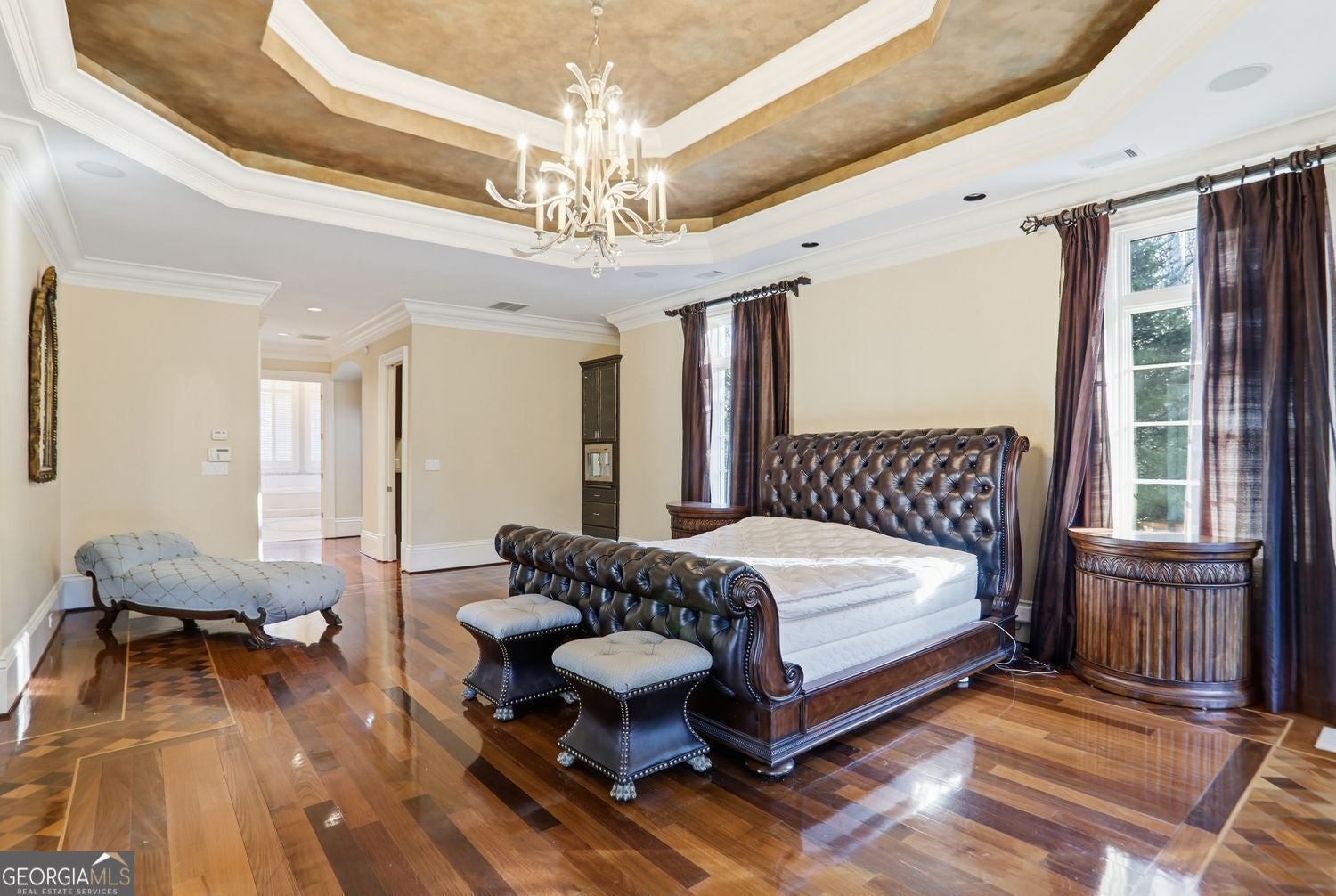 Set on 3.8 beautifully manicured acres, this elegant gated estate offe – image 103
