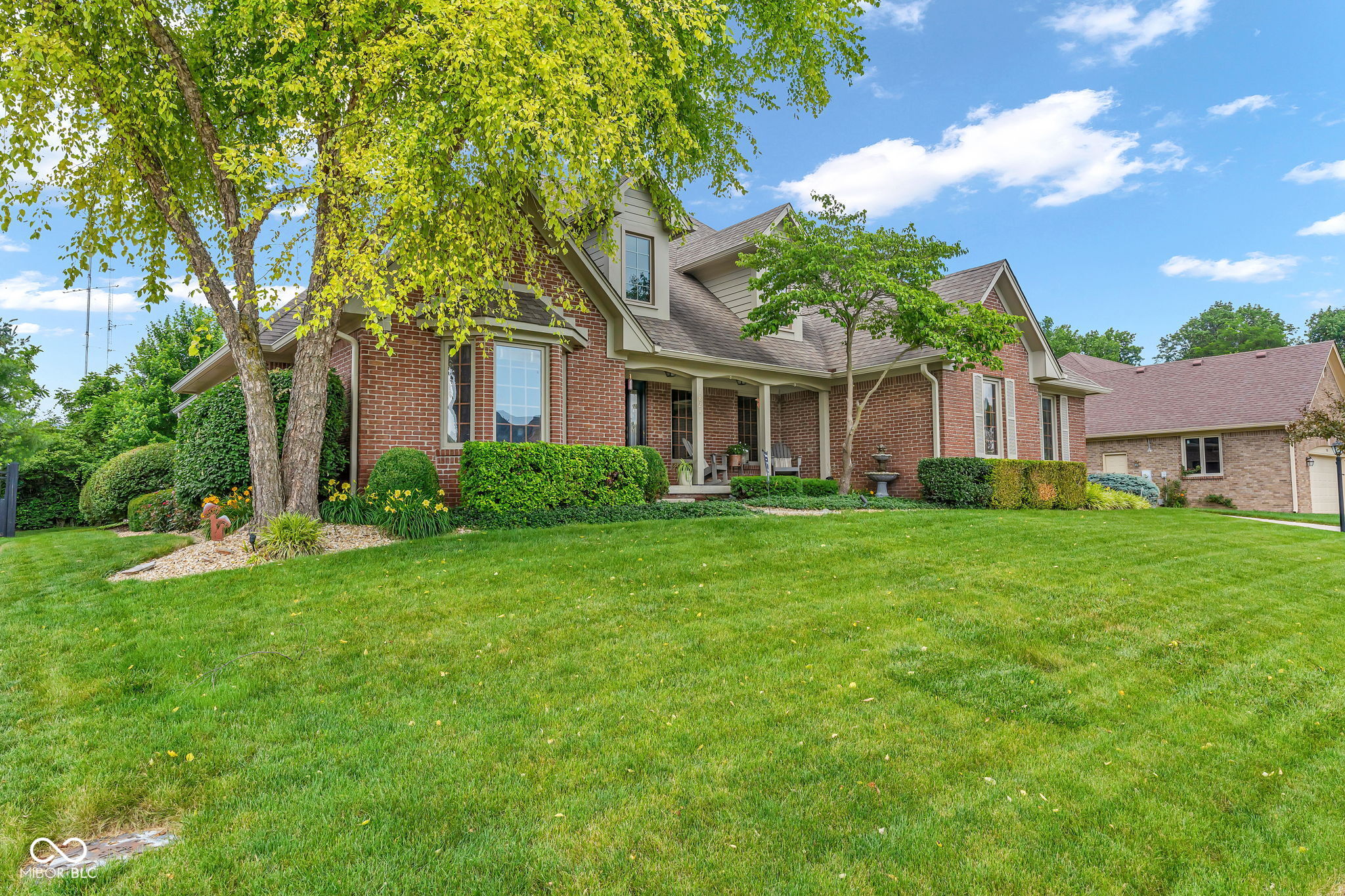 Step inside and instantly feel at home in this custom brick Cape Cod n – image 65