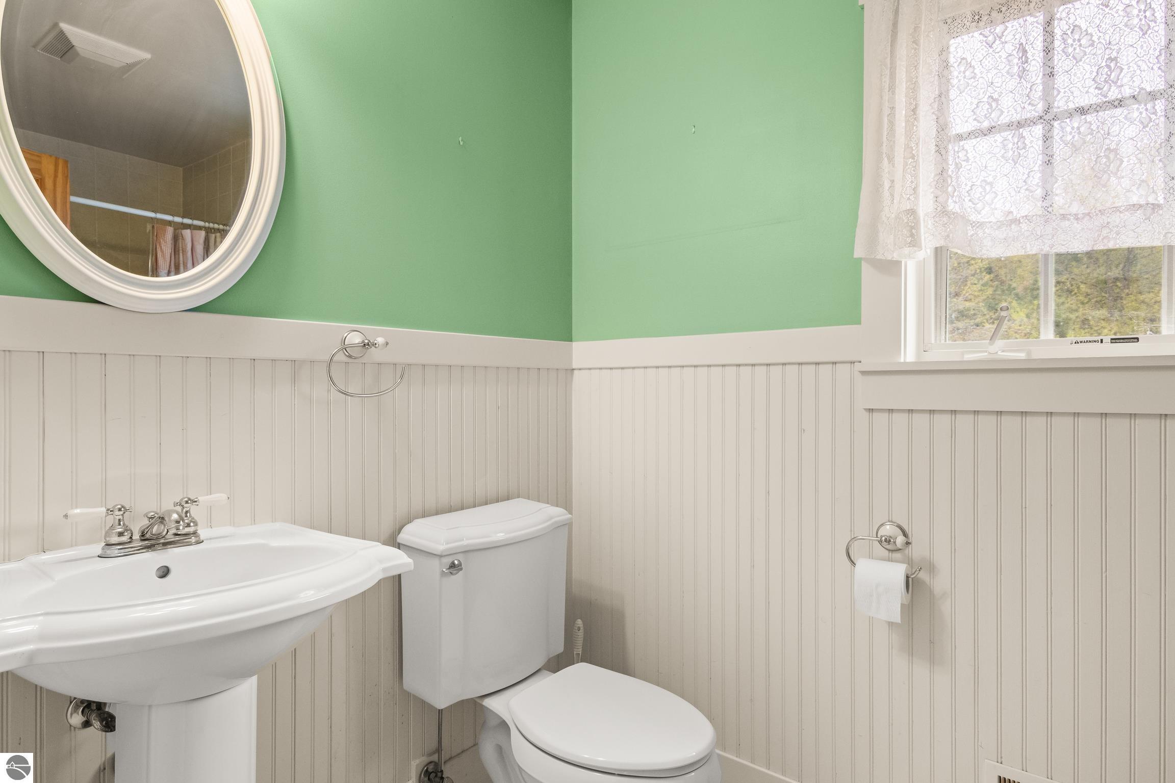 This 3-bedroom, 2.5-bath farmhouse offers a property designed for coun – image 30
