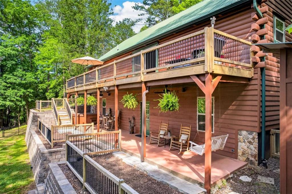 Fully furnished true log home on 5.78 private wooded acres in sought-a – image 43