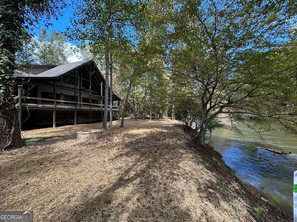 Welcome to your Private RIVERFRONT DREAM HOME on the shimmering shores – image 52