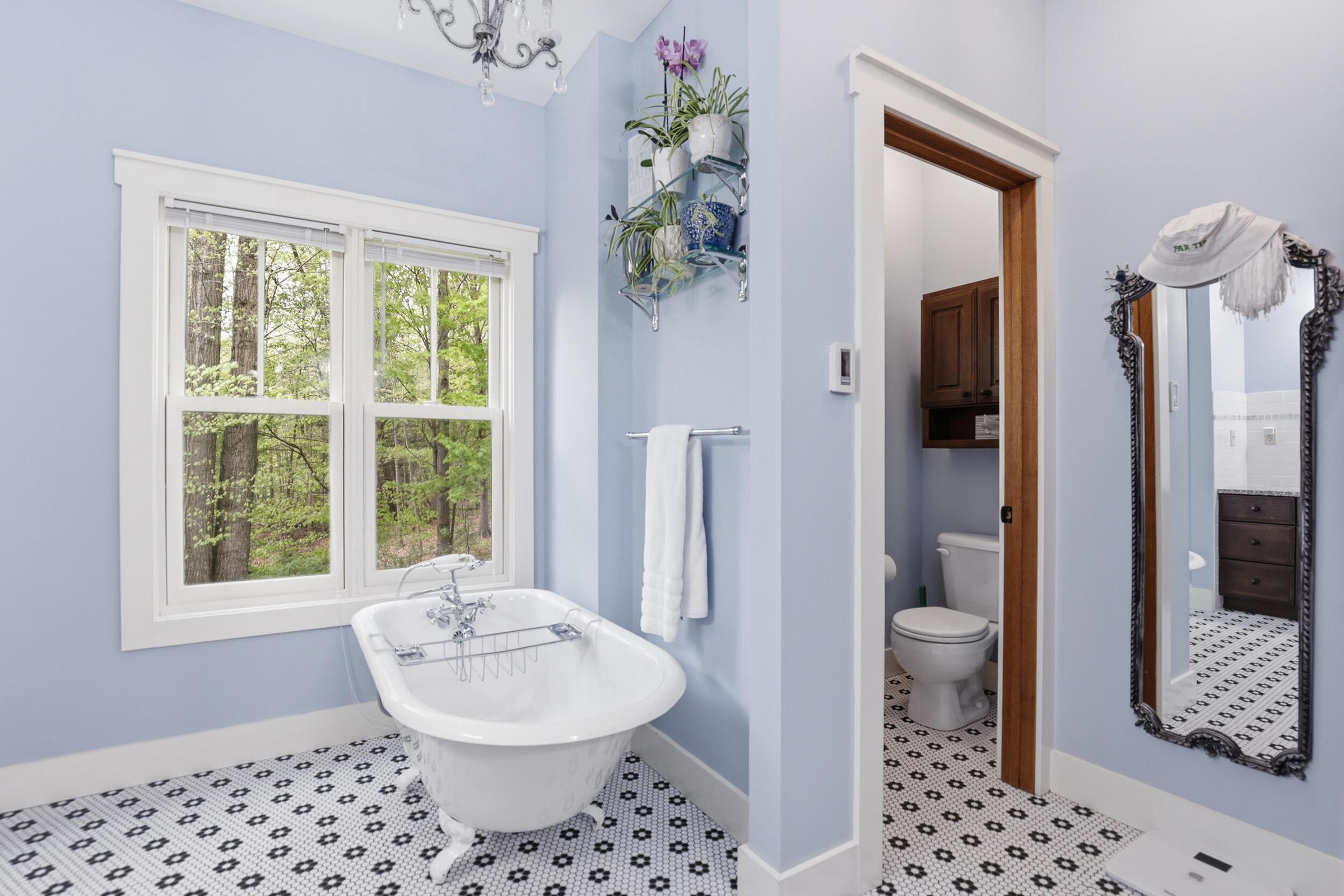 Tucked away on over an acre along the Little Muskegon River in the hea – image 29