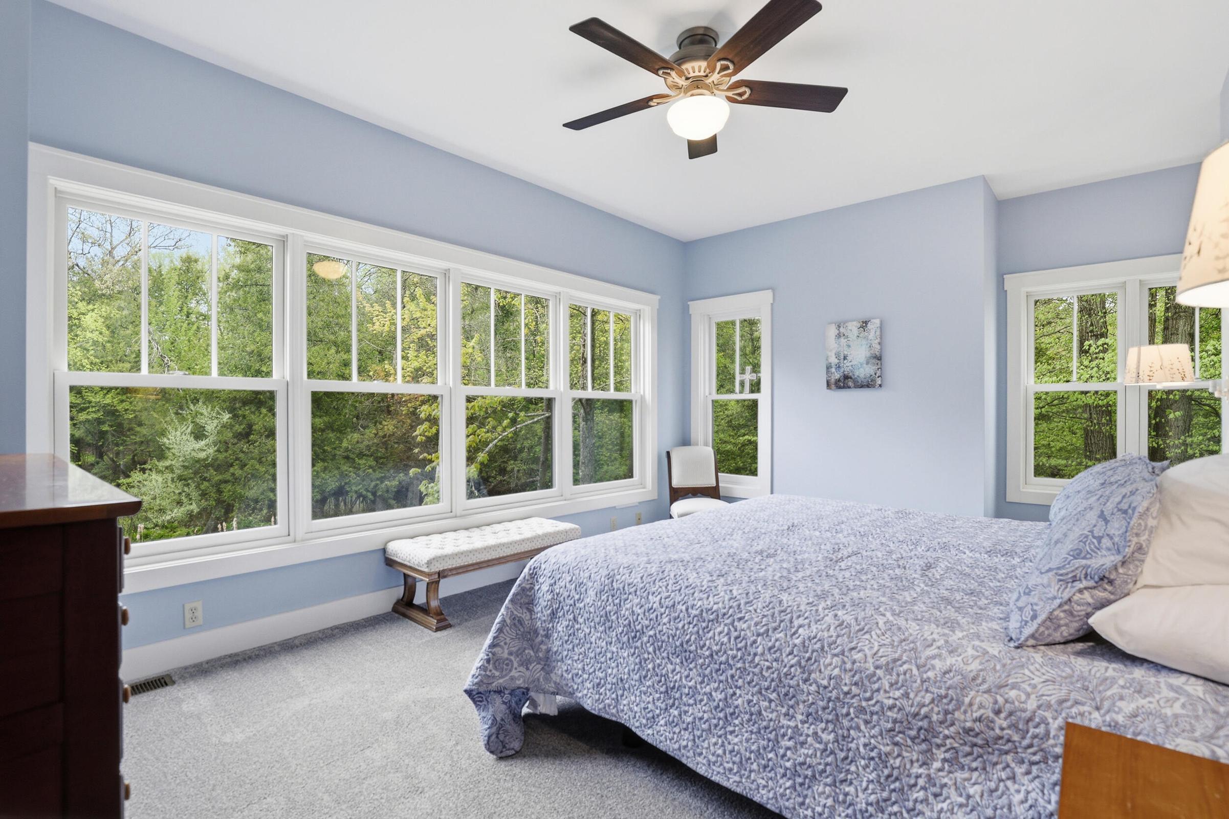 Tucked away on over an acre along the Little Muskegon River in the hea – image 25