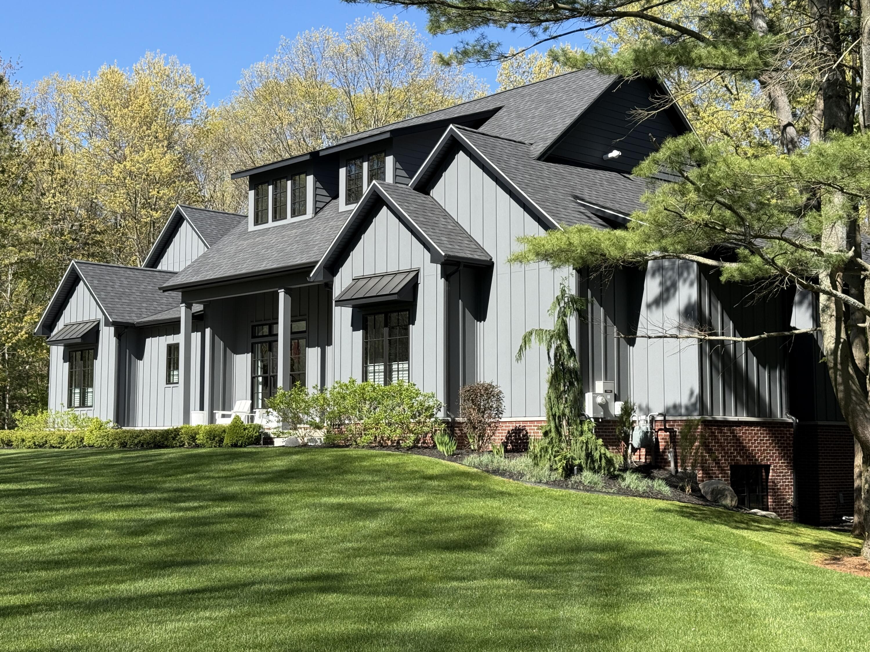 Behind the private gates of Gaslight Estates sits this exceptional, cu – image 1