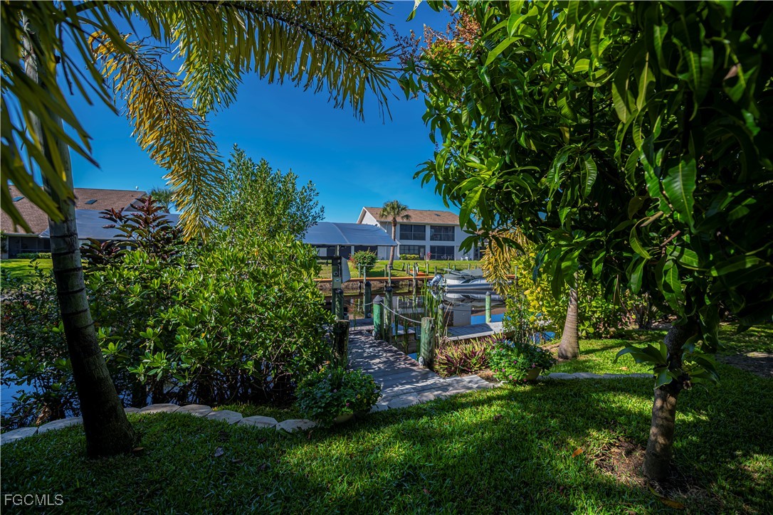 Welcome to your future GULF ACCESS HIDDEN GEM OF A home in the charmin – image 38