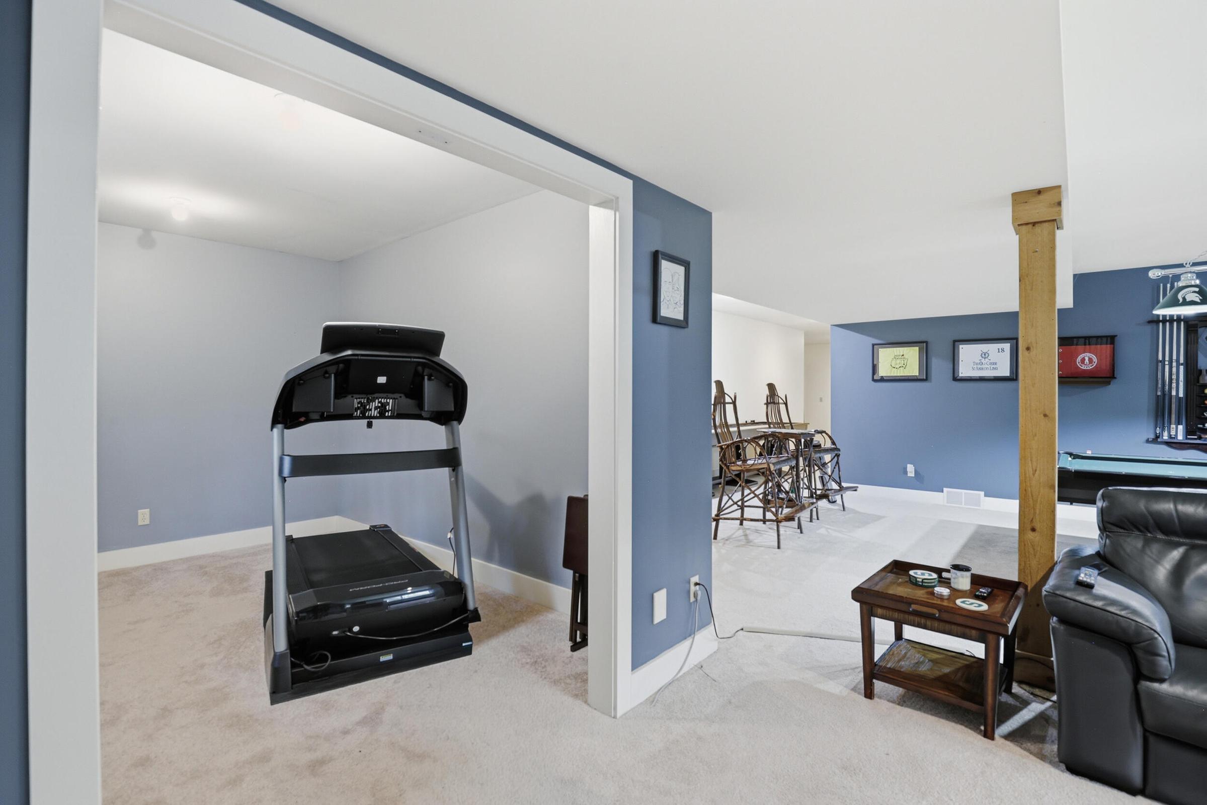 Tucked away on over an acre along the Little Muskegon River in the hea – image 38