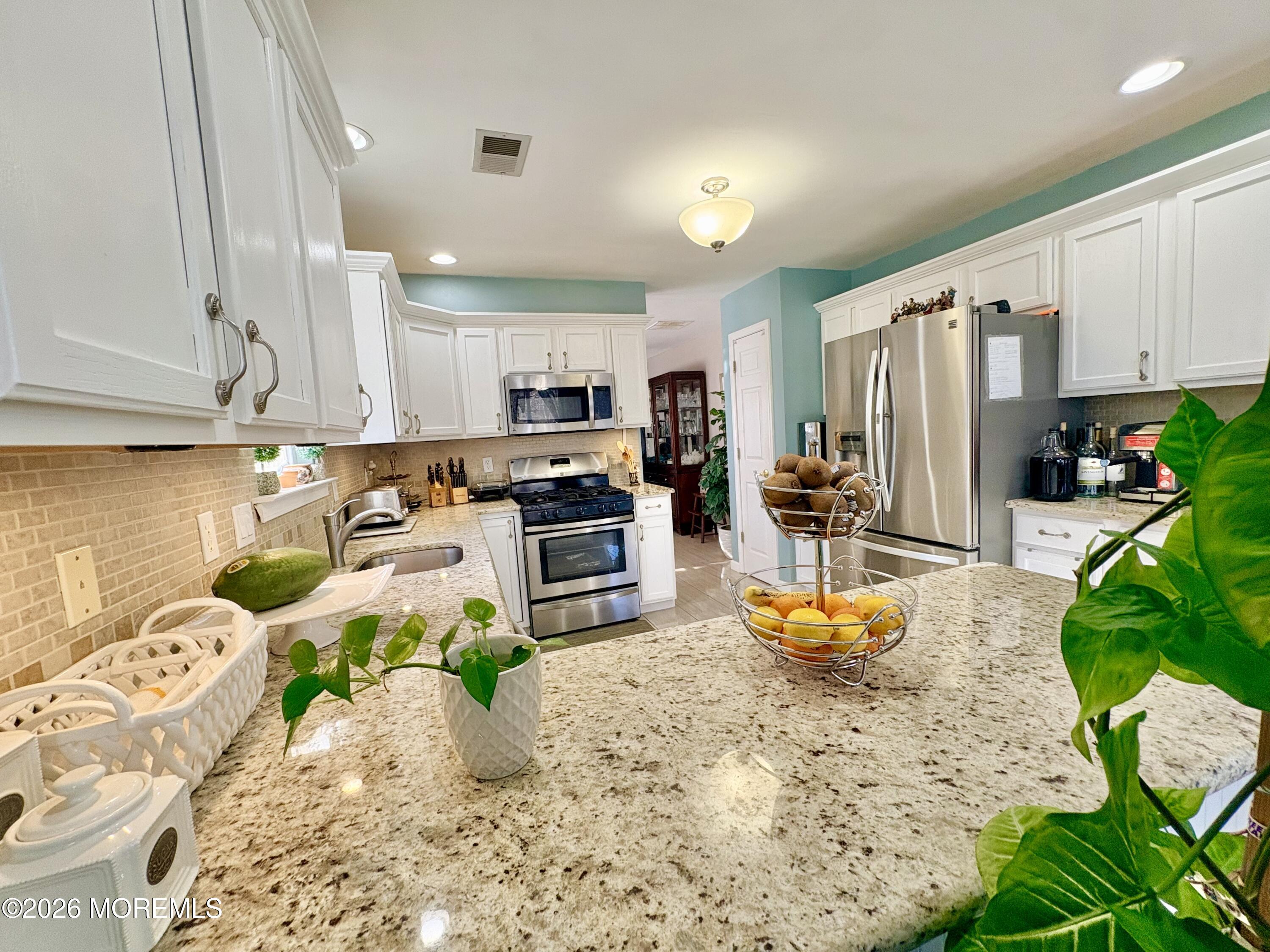 No expense spared in this impeccably upgraded home in the sought-after – image 5