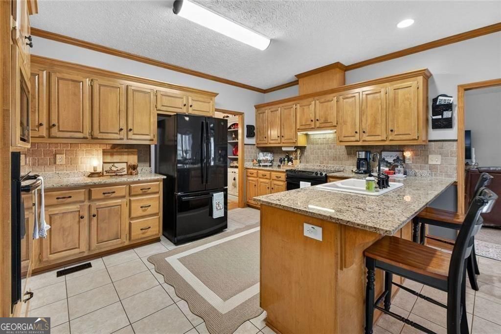 WOW - TWO HOMES ON ONE LOT!!! From the moment you arrive, the quality – image 16