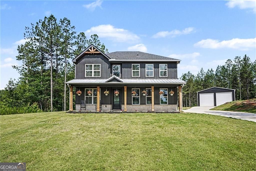 Nestled on 14.38 acres in the countryside, this beautiful 5-bedroom, 3 – image 2