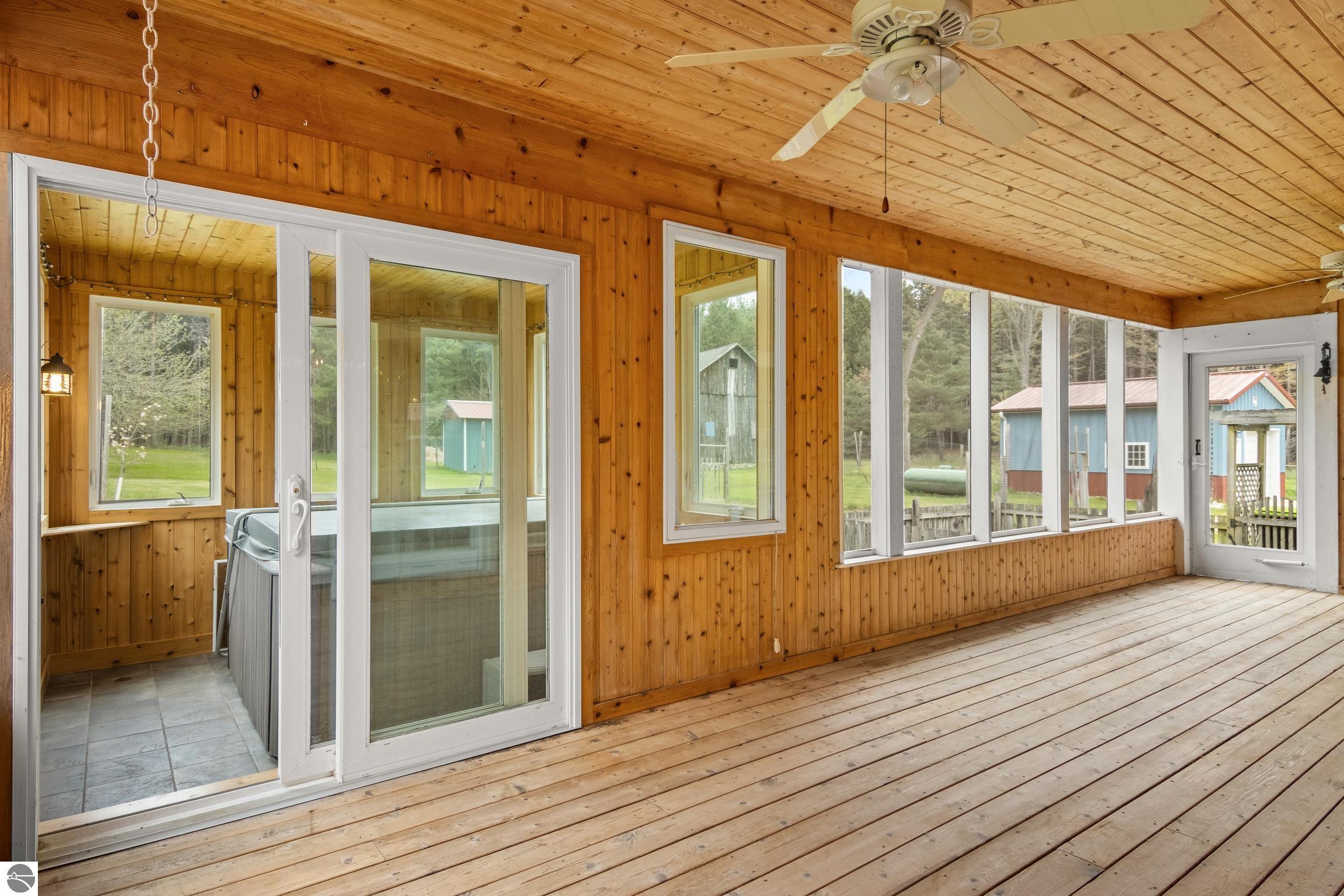 This 3-bedroom, 2.5-bath farmhouse offers a property designed for coun – image 42