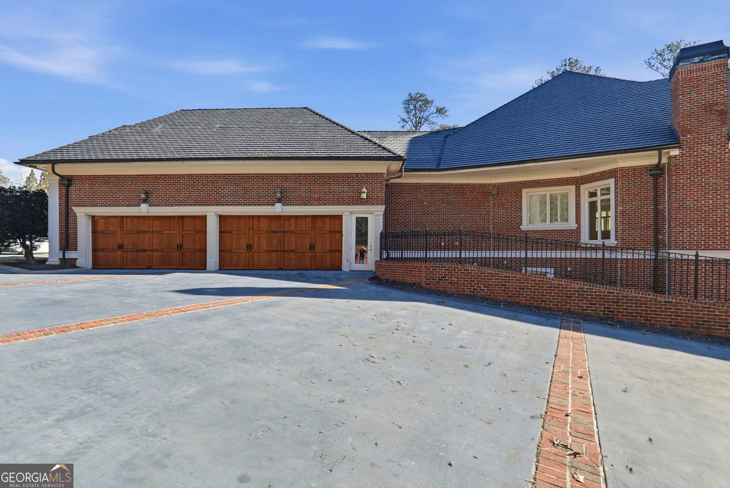 Set on 3.8 beautifully manicured acres, this elegant gated estate offe – image 145