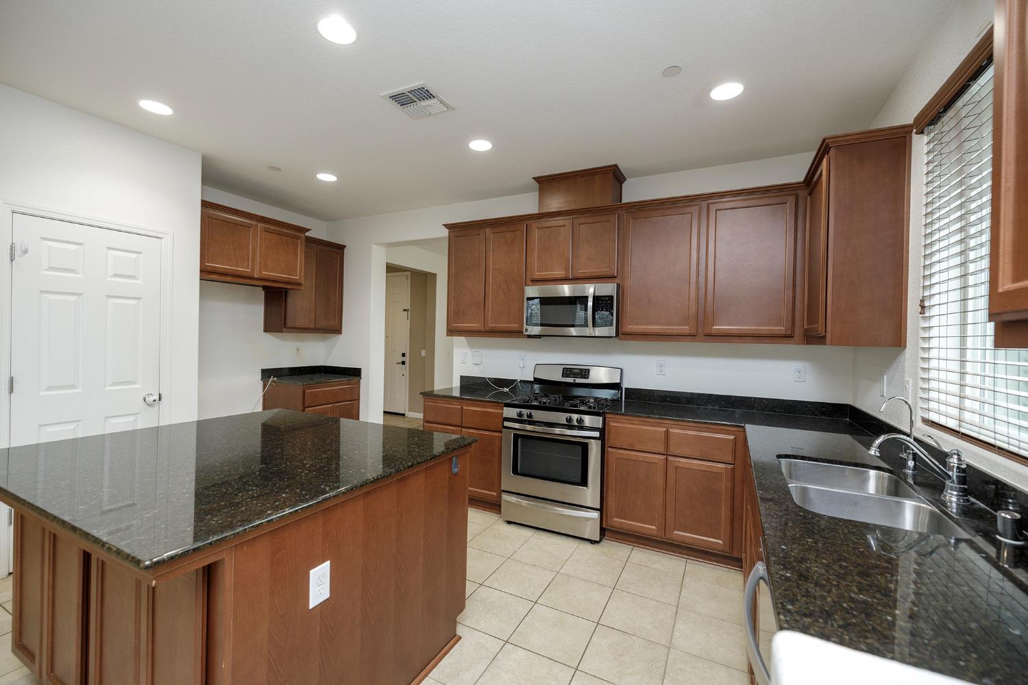 Located in a highly desirable neighborhood, this well-maintained home – image 5