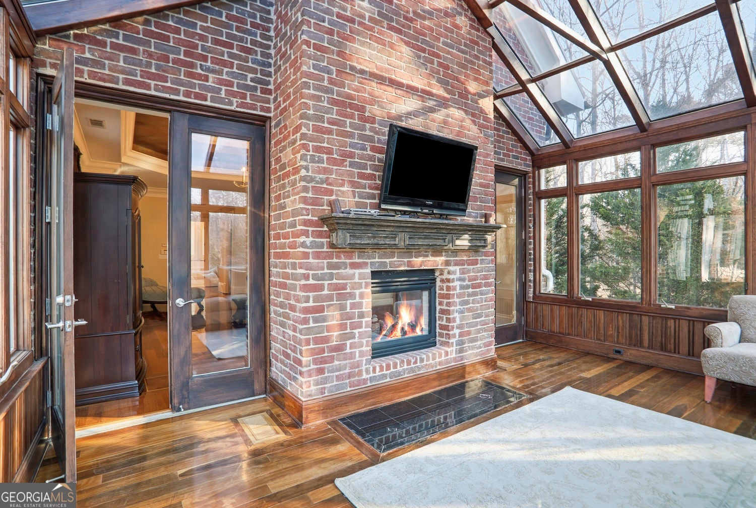 Set on 3.8 beautifully manicured acres, this elegant gated estate offe – image 107