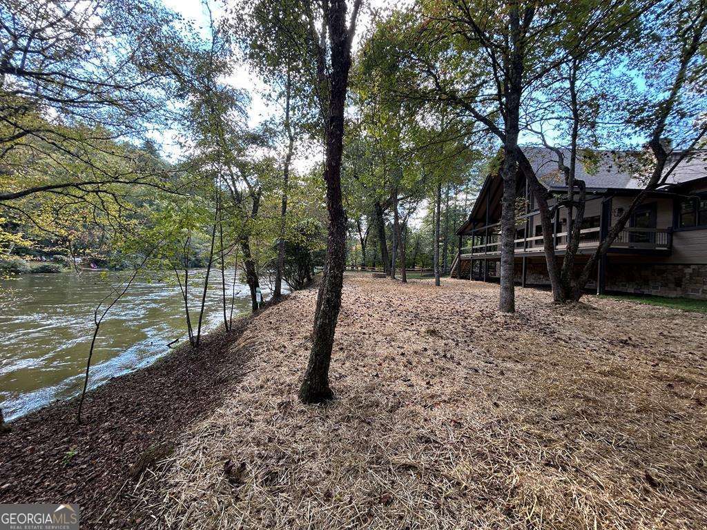 Welcome to your Private RIVERFRONT DREAM HOME on the shimmering shores – image 62