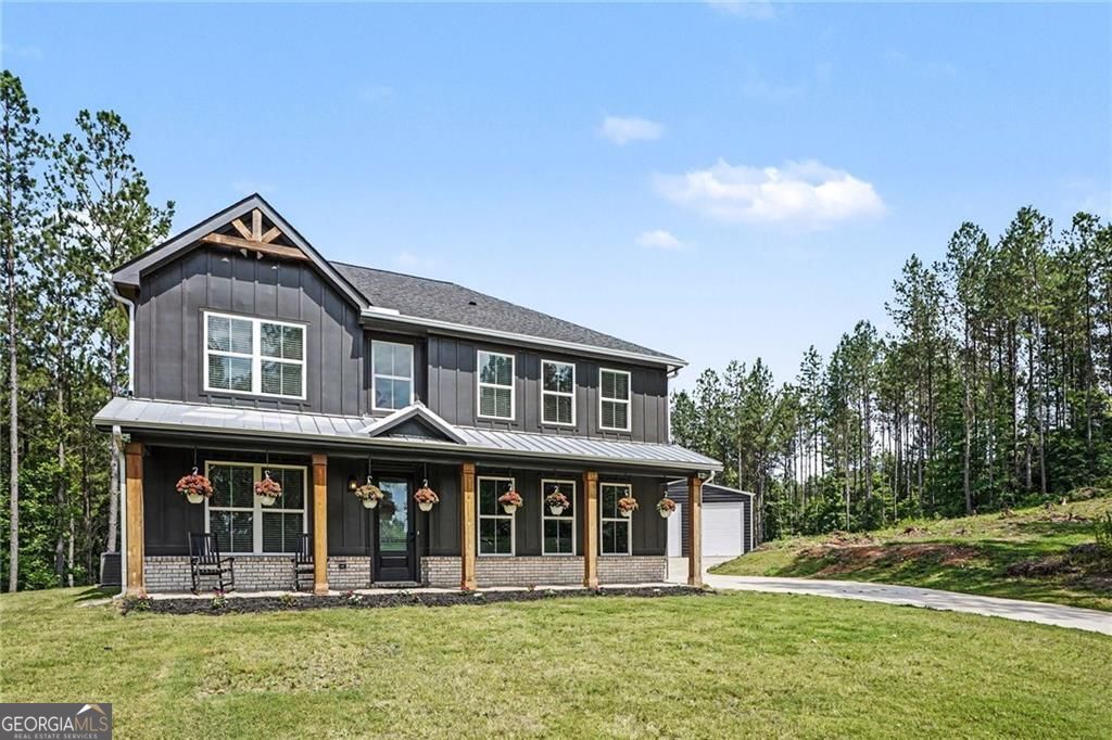 Nestled on 14.38 acres in the countryside, this beautiful 5-bedroom, 3 – image 1