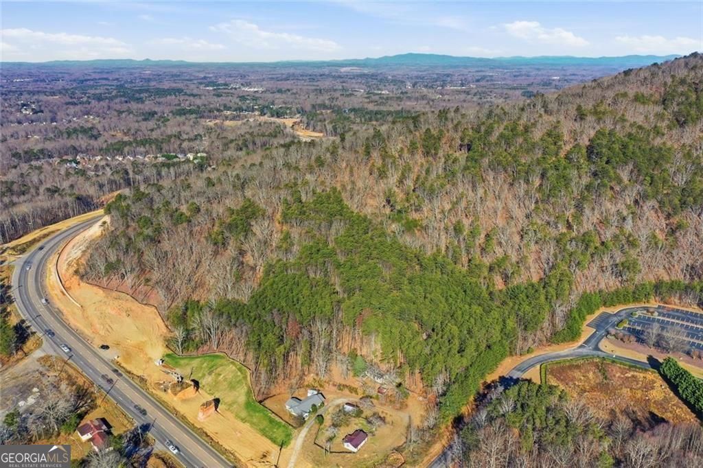 A mountain retreat in the heart of Forsyth. This extraordinary 6+ acre – image 1