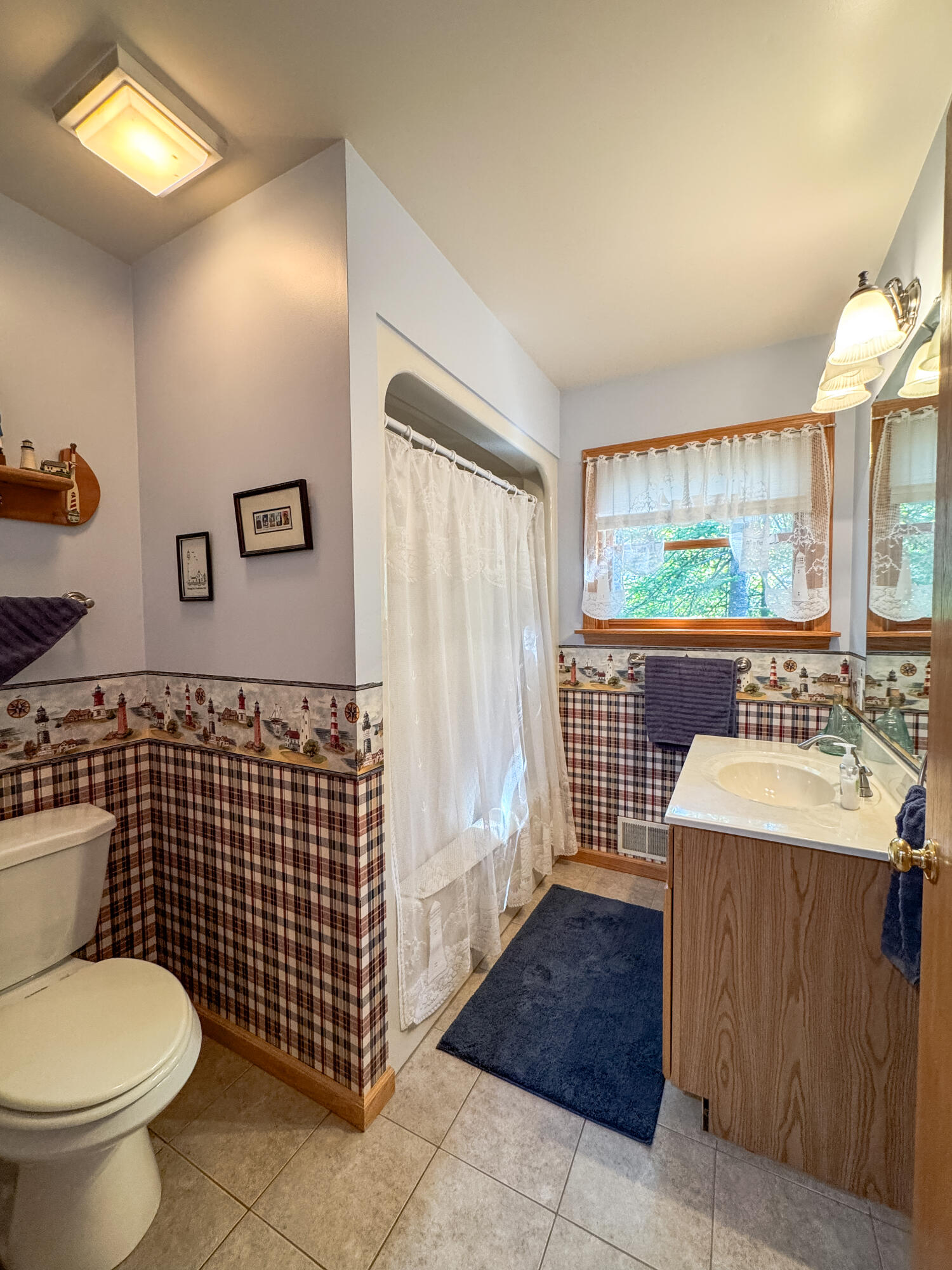This one-owner ranch home on Lake Huron offers a perfect blend of comf – image 19