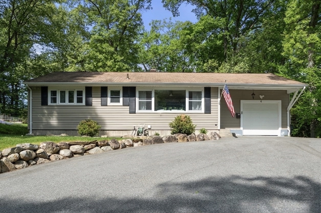 Updated ranch-style home set on a spacious 0.57-acre lot in desirable – image 1