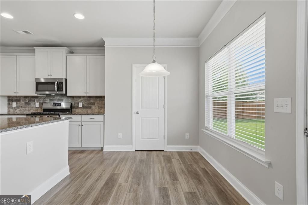 Flawlessly maintained and thoughtfully designed, this home exudes the – image 23