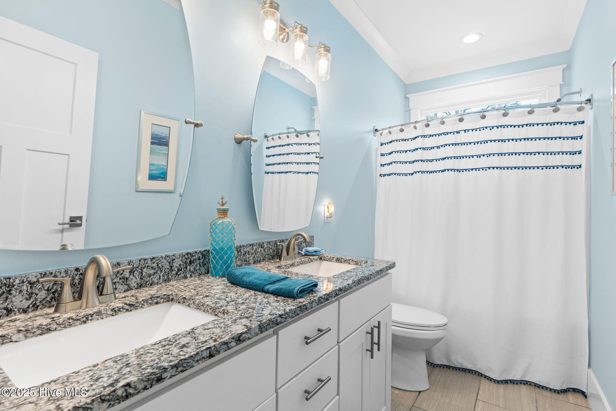 Welcome to 205 NE 59th Street, where coastal charm meets high-end craf – image 40