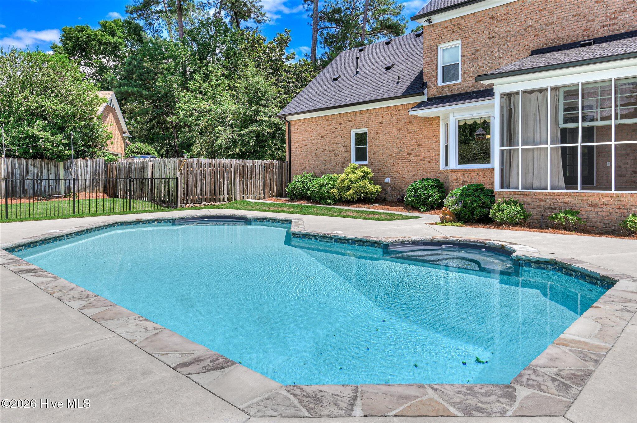 Welcome to this stunning brick home nestled on a quiet cul-de-sac in t – image 61