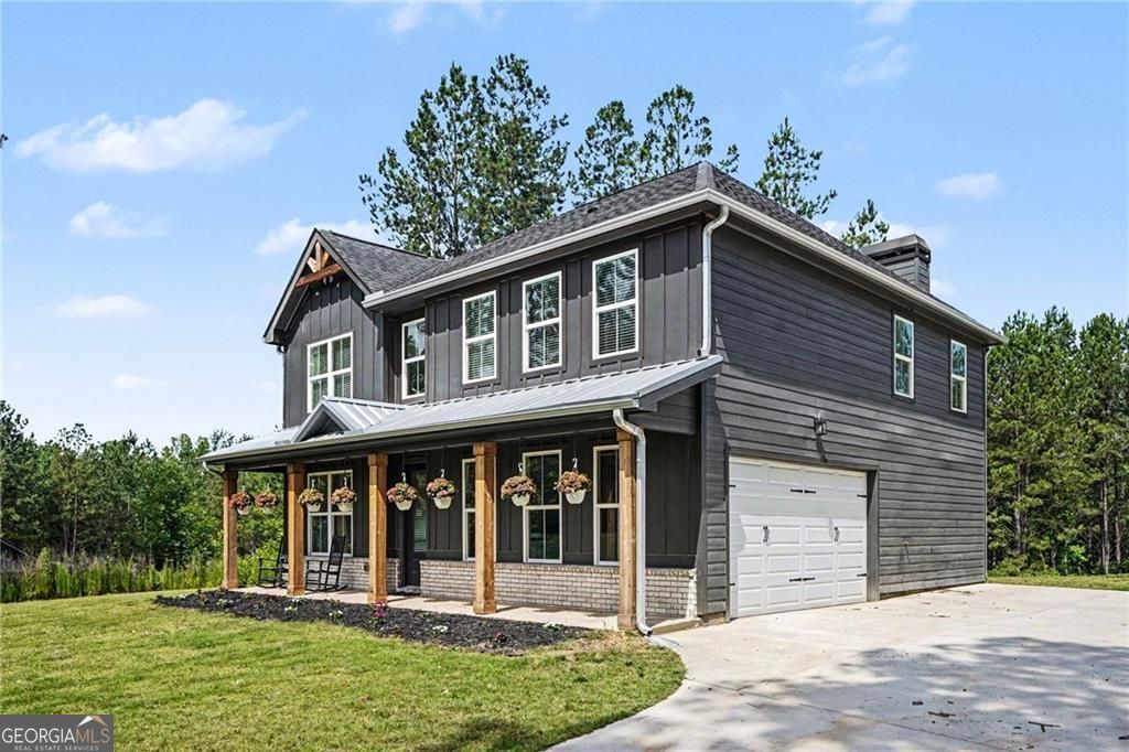Nestled on 14.38 acres in the countryside, this beautiful 5-bedroom, 3 – image 4