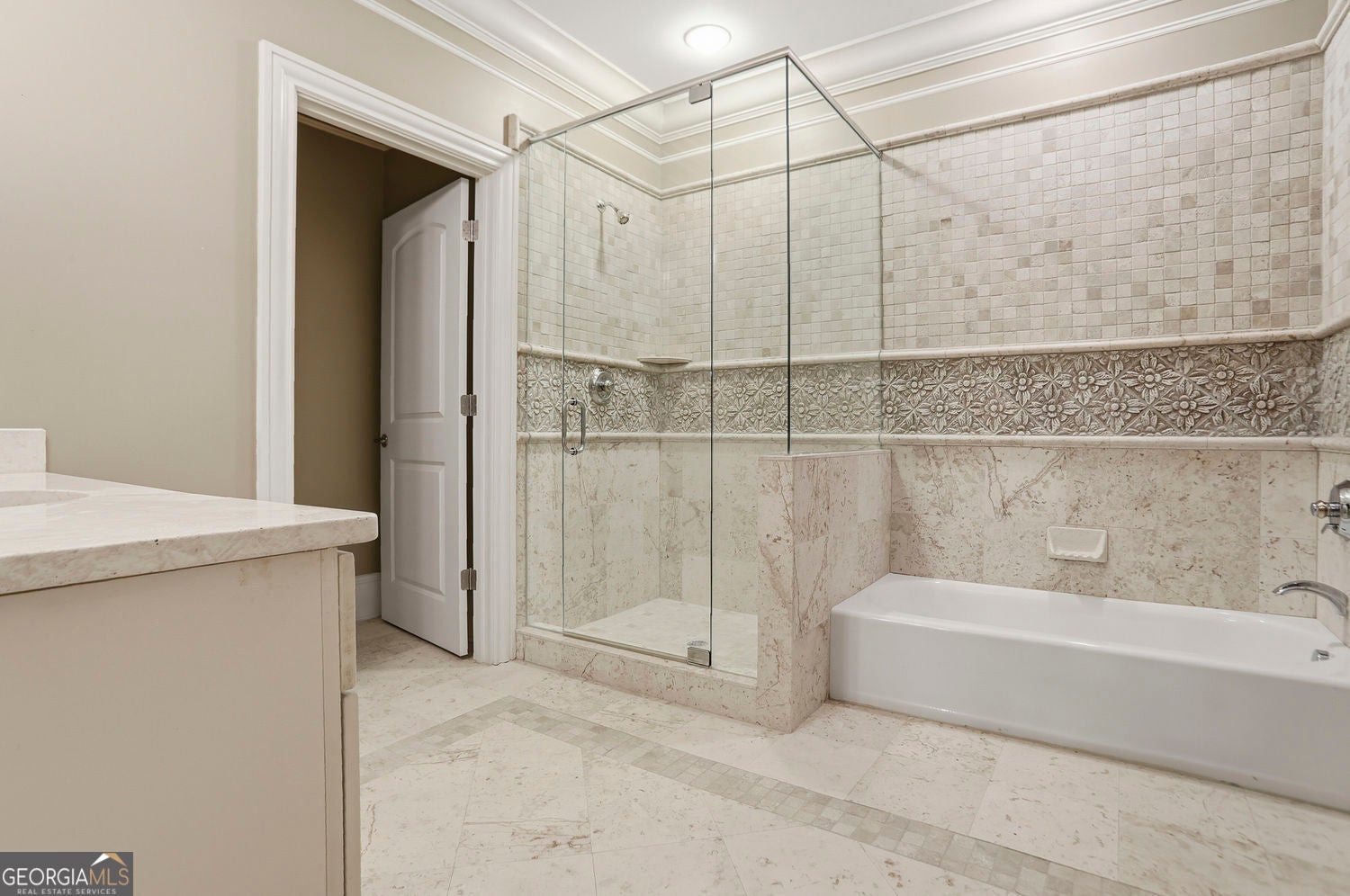 Set on 3.8 beautifully manicured acres, this elegant gated estate offe – image 117