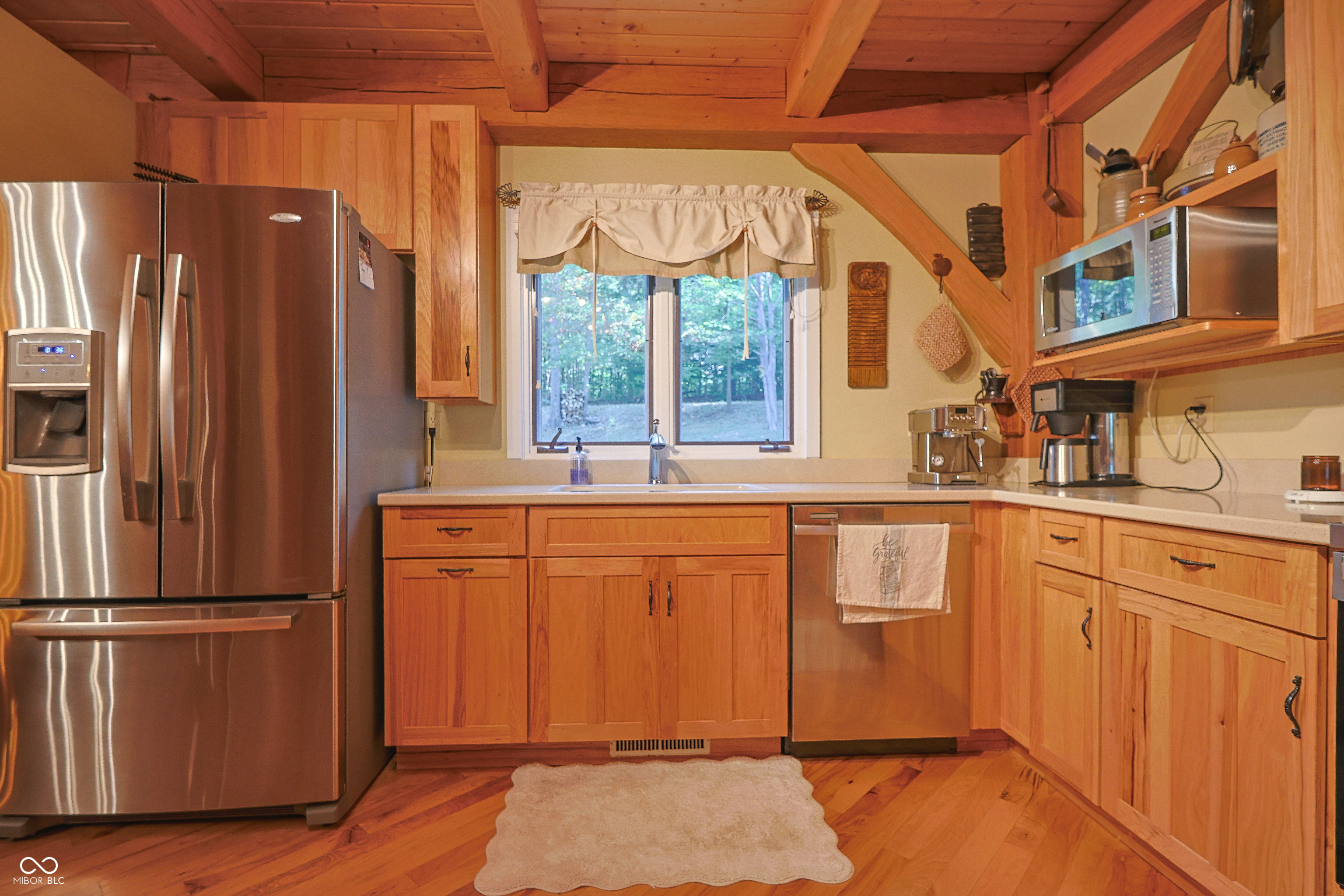 Custom red oak timber-frame home with Lake Monroe views, located in Sa – image 23