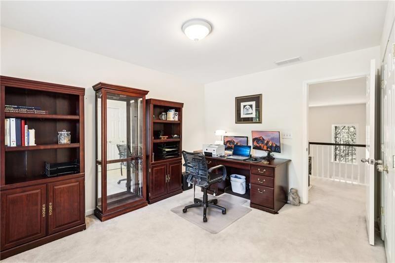 This beautiful home located on a cul-de-sac backs up to a private wood – image 40