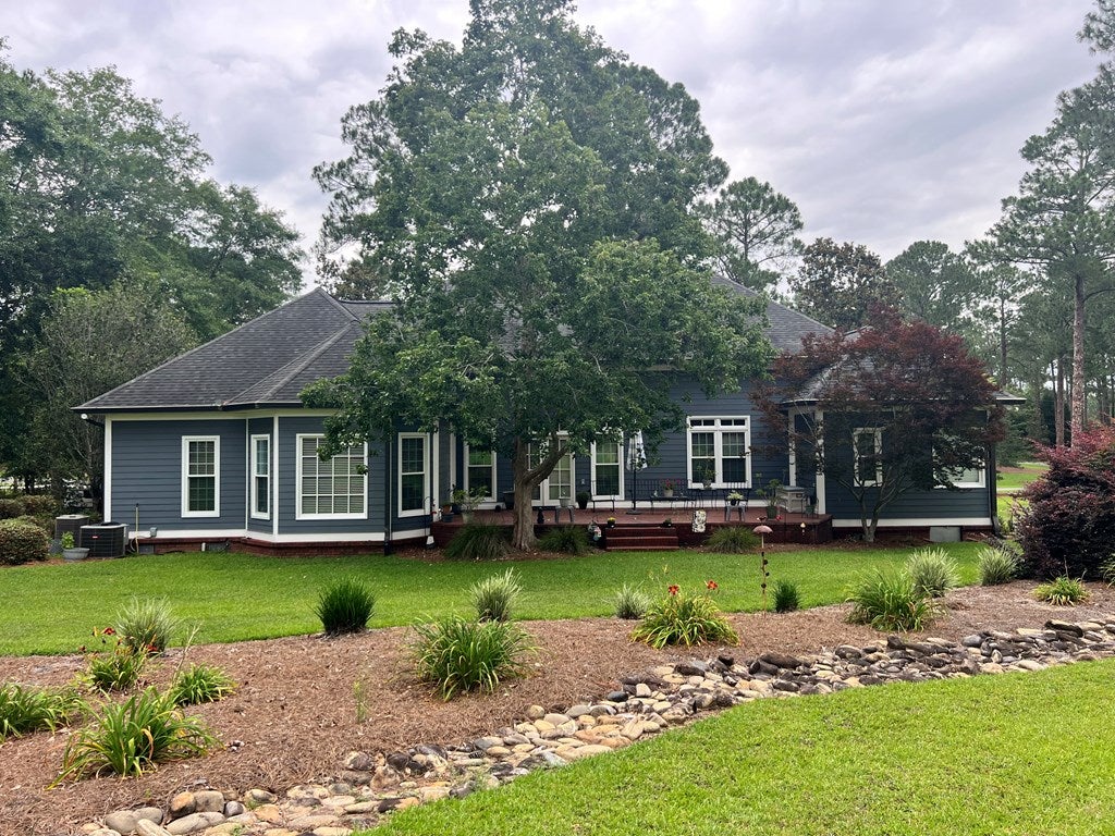 Welcome to 12 Fairway Dr! Experience elevated living in this stunning – image 2