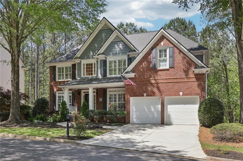 This beautiful home located on a cul-de-sac backs up to a private wood – image 2